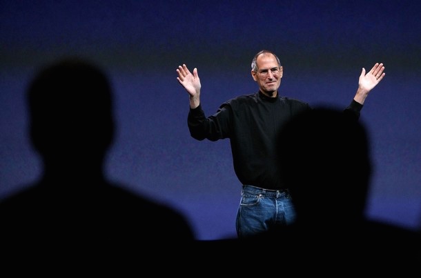 A thinner Steve Jobs on stage at the